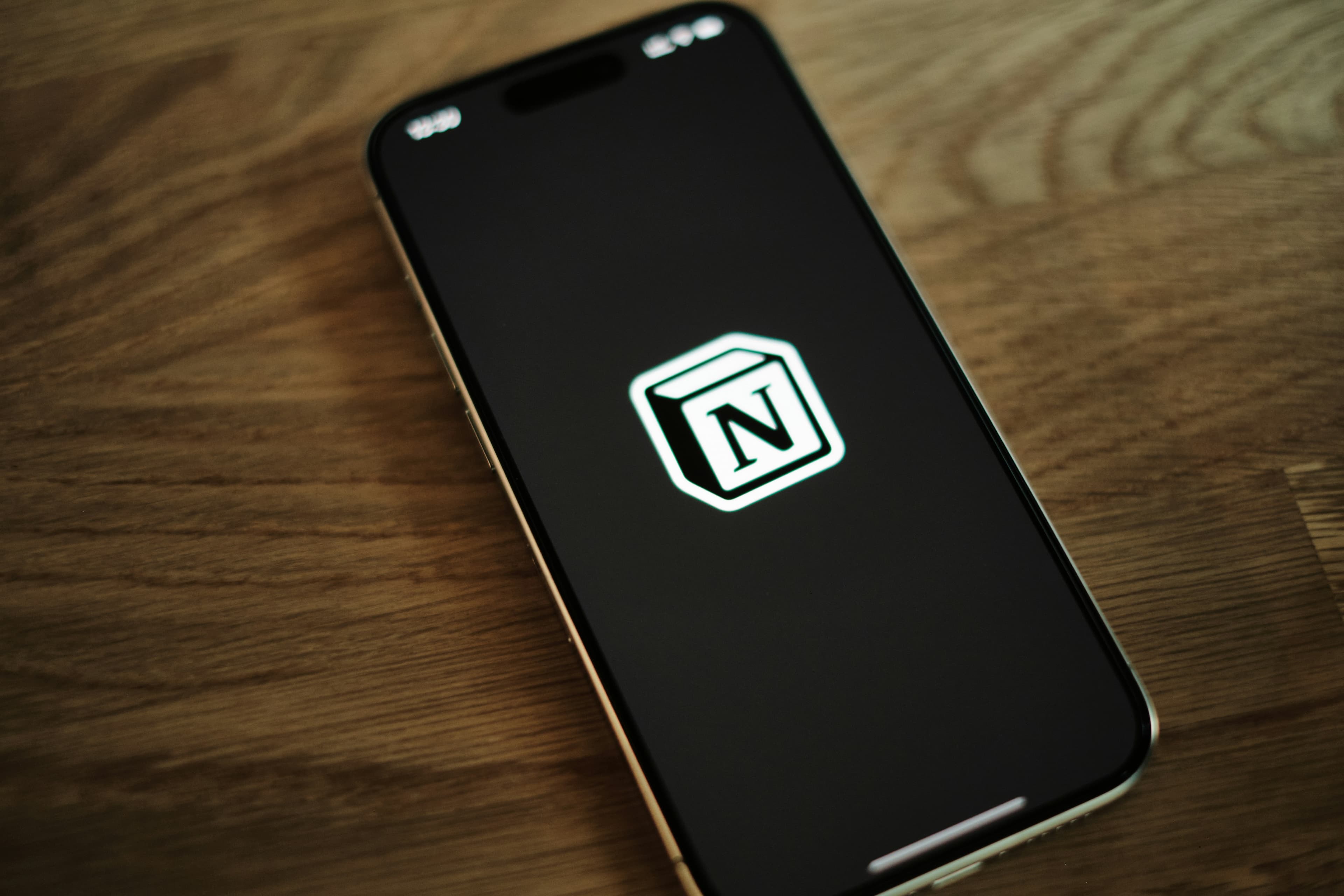 An iphone with the Notion app logo