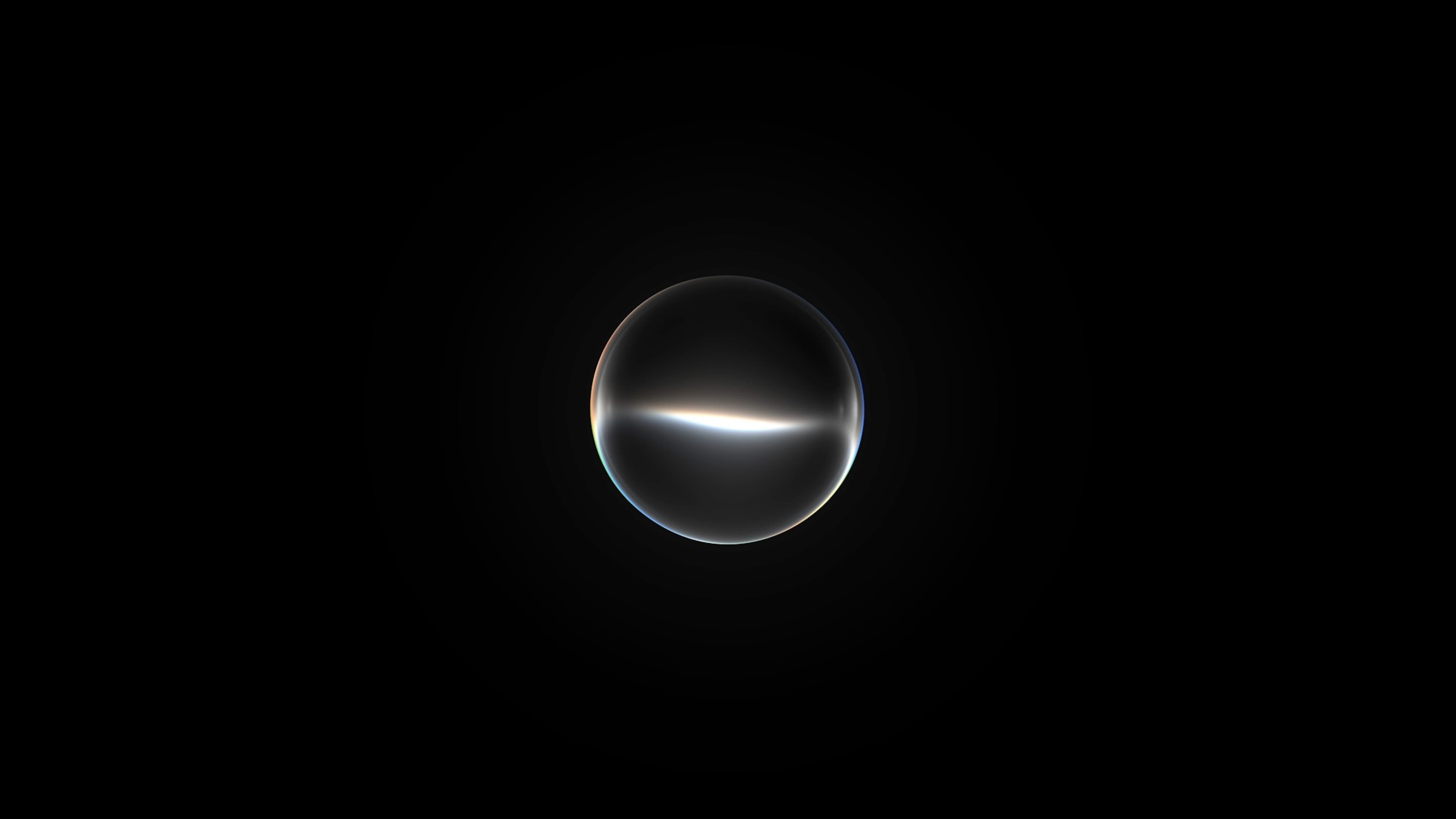 En glødende Siri-orb mot svart bakgrunn.