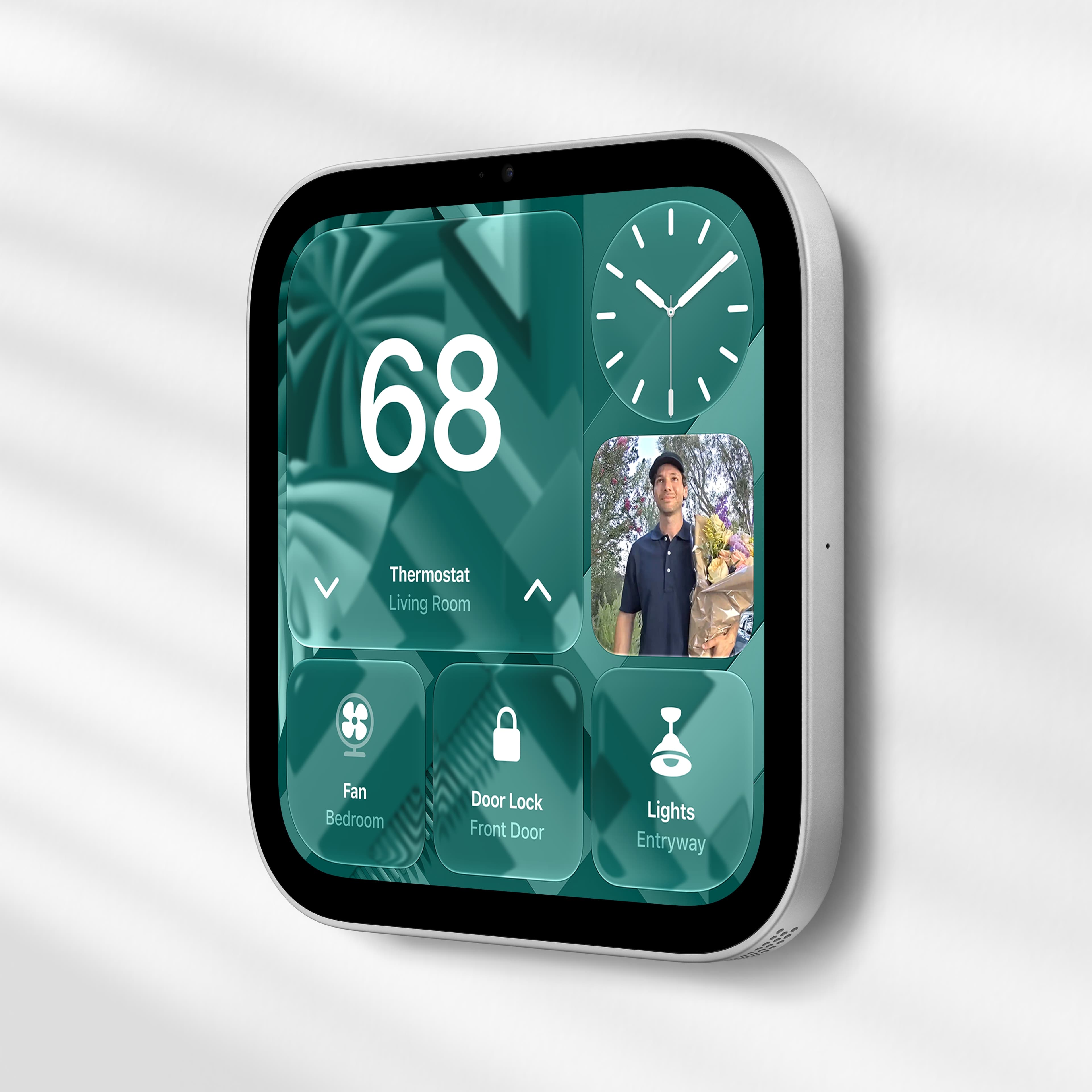 Veggmontert Apple HomeView viser termostat, dørkamera, vifte, dørlås og lys.