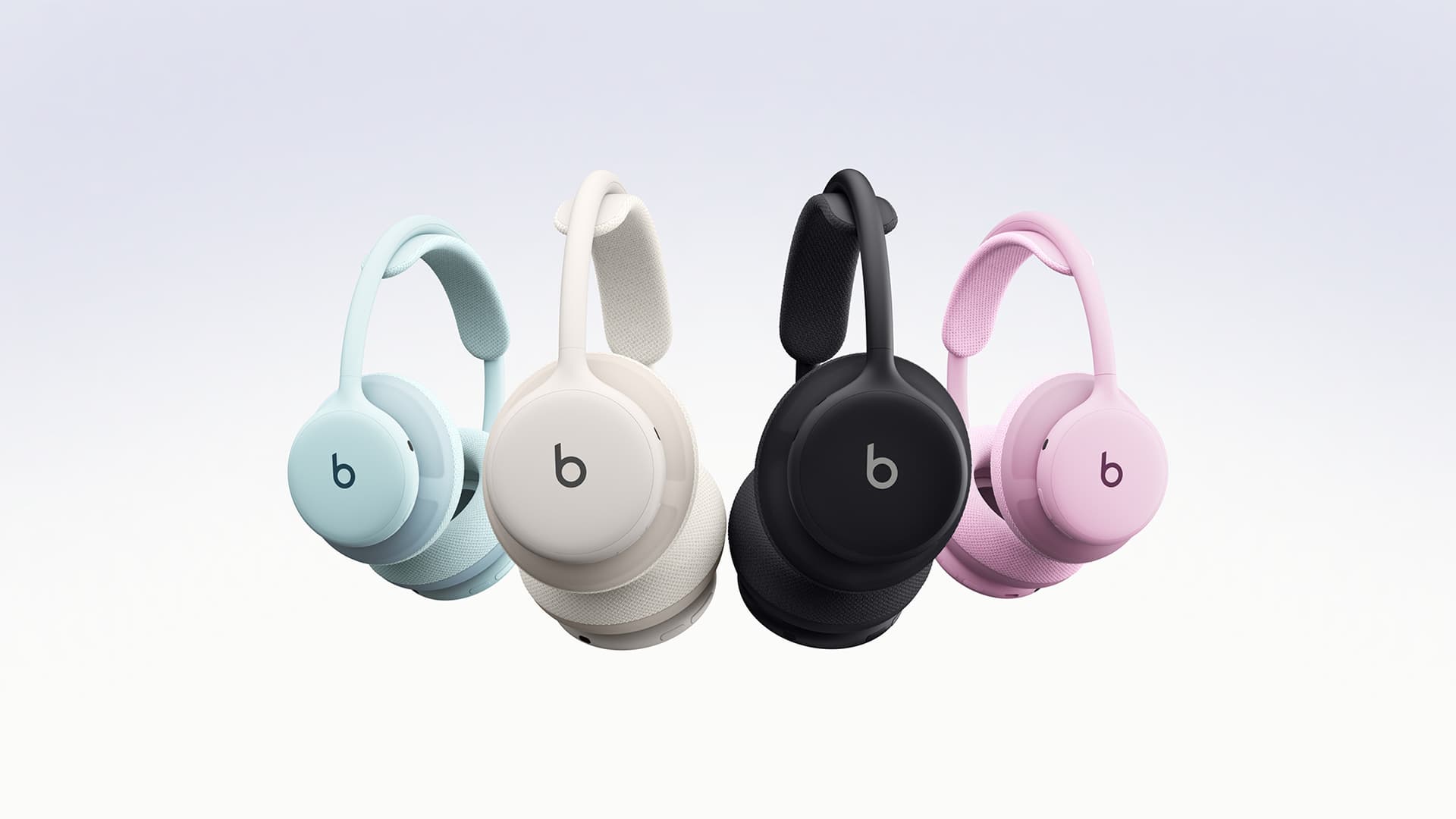 Fire Beats 360-hodetelefoner i himmelblå, porselenshvit, svart og rosa med matchende puter